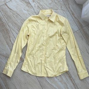 Light yellow button up top